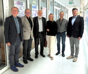 From left: prof. A.Kri&scaron;čiukaitis, prof. A. Luko&scaron;evičius, prof. A. Kopustinskas with members of the audience