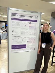 K. Eitminavičienė at her poster presentation