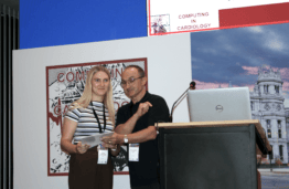 K. Eitminavičienė receives the award from Dr. Pyotr Platonov