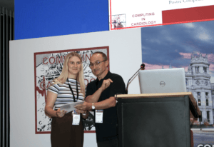 K. Eitminavičienė receives the award at the CinC 2026 conference.